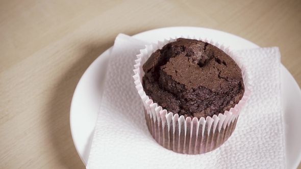 Muffin on a Plate and Pouring Coffee Into a Cup