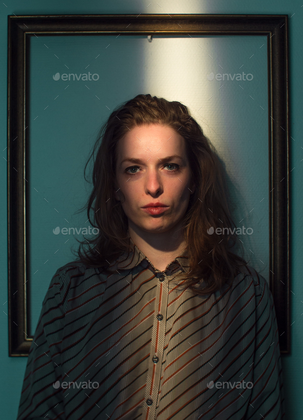 expressive caucasian female portrait,framed in frame