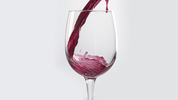 Red Wine Poured Into Glass
