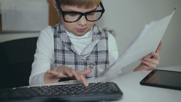 Cute Little Girl Willingly Works with Pc in Office. alt
