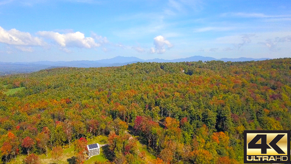 Rising Over Vermont Forest In Fall