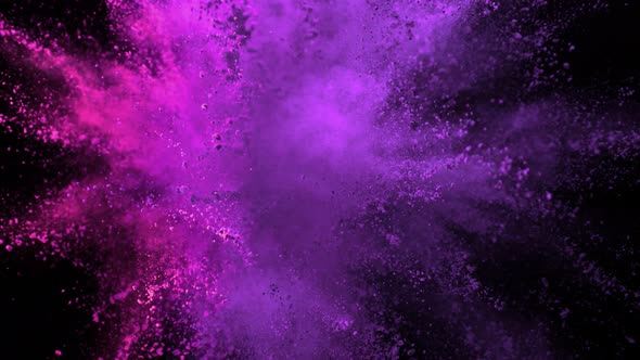 Super Slow Motion Shot of Purple Powder Explosion Isolated on Black Background at 1000Fps alt