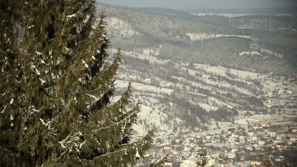 Village in Mountains at Winter Sunny Day