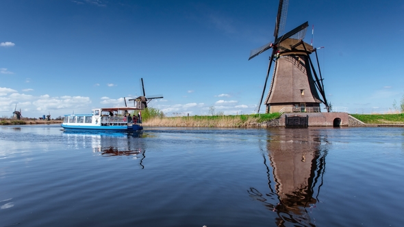 Ancient Windmills on Riverbank. Beauty of Holland. World Most Picturesque Places alt