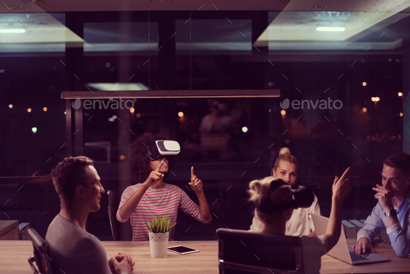 Multiethnic Business team using virtual reality headset - Stock Photo - Images