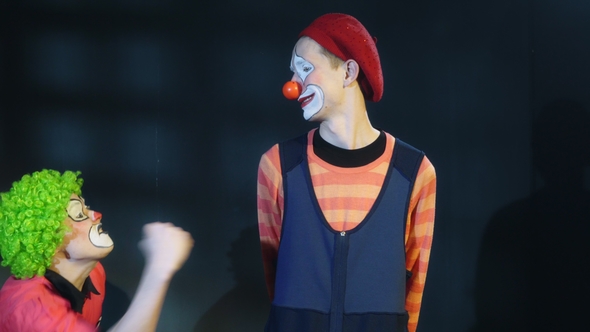 Two Clowns Are Performing Funny Show