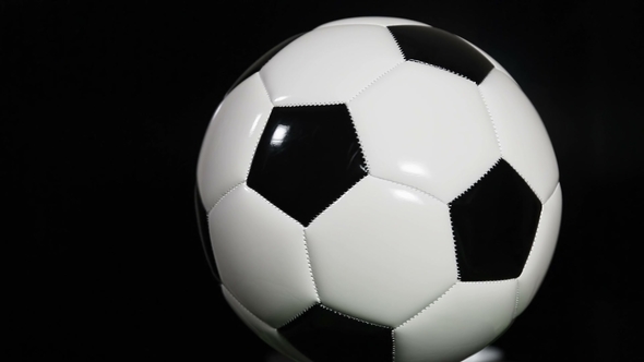 Soccer Ball Is Spinning on a Black Background