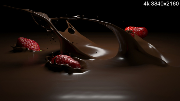 Strawberries Falling into Melted Chocolate