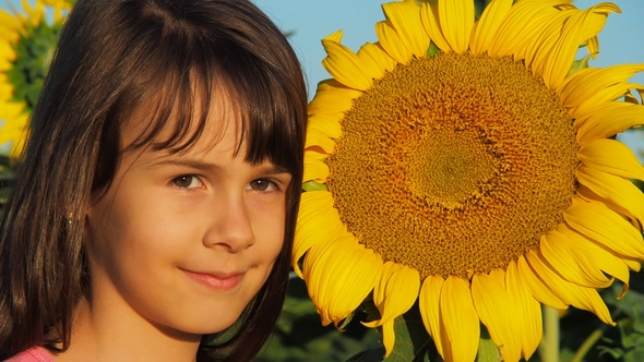 Little Girl with a Big Sunflower alt