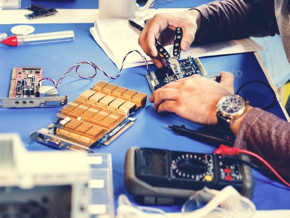 Technicians working on electronics parts Stock Photo by Rawpixel | PhotoDune
