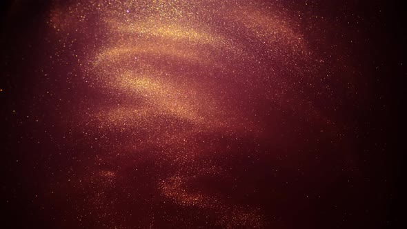 Red Abstract Glowing Falling Particles, Slow Motion, on Black Background alt