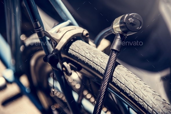 Metal lock on a bicycle wheel Stock Photo by Rawpixel | PhotoDune