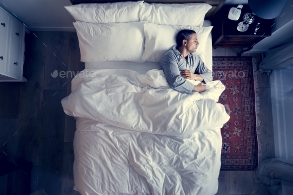 French man sleeping alone on bed Stock Photo by Rawpixel | PhotoDune