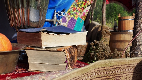 Books and the Samovar Standing on the Table