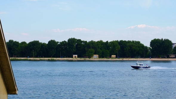 Boat on the River in the City