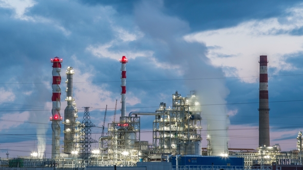  Industrial Pipelines of an Oil-refinery Plant at Twilight alt