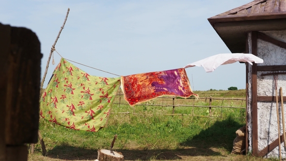 Rags Drying on the Clothesline in the Village
