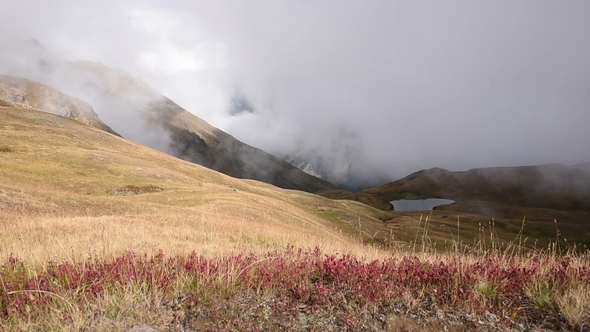 Thick Clouds Covering One of the Hills on the Caucasian Ridge Near Koruldi Lakes. Upper Svaneti