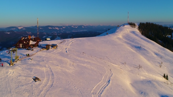 Flying over Snow Covered Winter Mountain Landscape by YouraPechkin