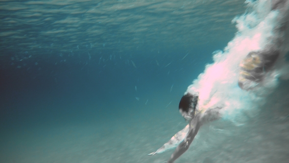 Woman in Blue Bathing Suit Swimming Underwater in, Stock Footage ...