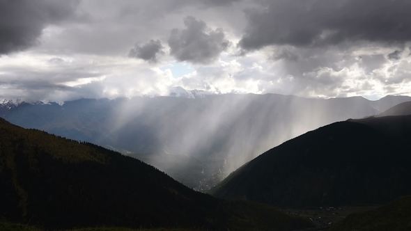 Dramatic Scene of Thick Clouds Floating Over Amazing Touristic Place the Ushba Mountain, Near the