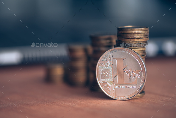 Trading with Litecoin cryptocurrency - Stock Photo - Images