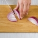 Slicing Onion on Wooden Cutting Board - VideoHive Item for Sale