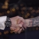 Handshake Between Clear and Tattooed Hands - VideoHive Item for Sale