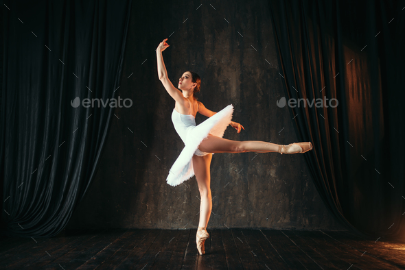Ballerina in white dress dancing in ballet class Stock Photo by NomadSoul1