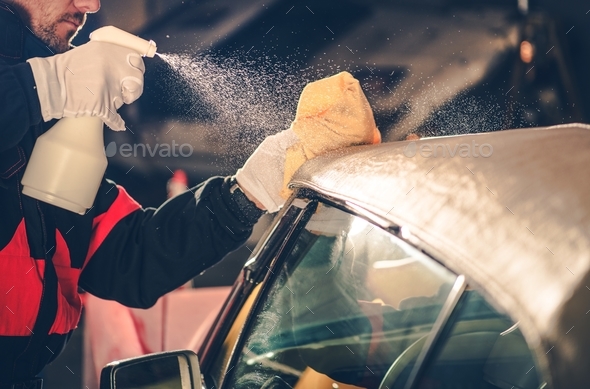 Convertible Car Roof Cleaning Stock Photo by duallogic | PhotoDune