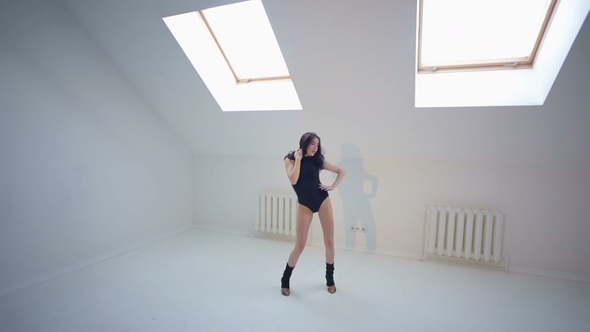 Sexy Girl Dancing Sensual Dance Bachata in Studio. alt