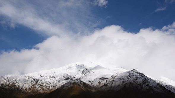 of Thick Clouds Floating Over Amazing Touristic Place Mountain Shkhara, Svaneti Region, Along the