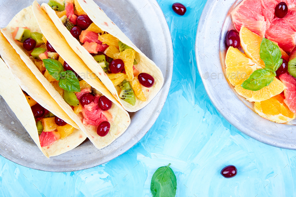 Fruit tacos. Summer snacks. - Stock Photo - Images