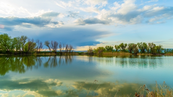 Reflection of Clouds in the Lake at Sunset. Michigan USA
