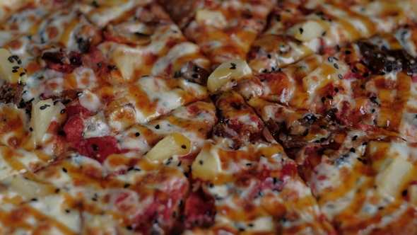 Two People Take a Slice of Hot Pizza Out of the Box alt