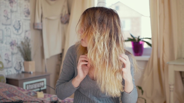 Girl Takes Care of Her Hair alt