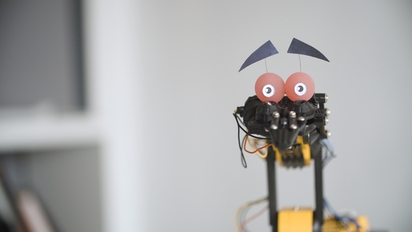 Funny Robot Is Shaking Head To Say YES. Experiment with Intelligent Manipulator. Industrial Robot alt