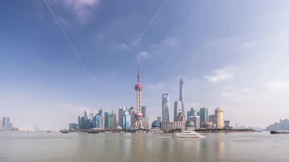 Timelapse of city skyline from day to night in Shanghai china alt