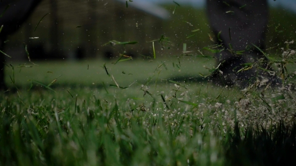 Golf Club Hitting Ball on the Green Artificial Grass  alt