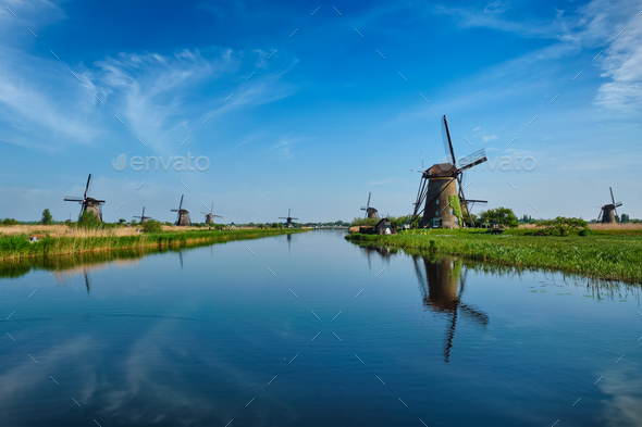 Windmills at Kinderdijk in Holland. Netherlands - Stock Photo - Images