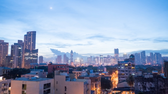 Early Dawn in the Capital of the Philippines in Manila. The Lights of Buildings. Shooting the alt