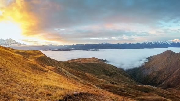 Thick Clouds Floating Over Mheer Mountain Chain at Sunset Filmed From Guli Pass