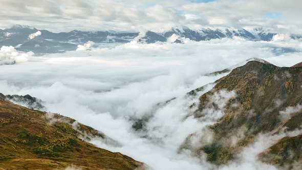 Thick Clouds Floating under Mheer Mountain Filmed from Guli Pass
