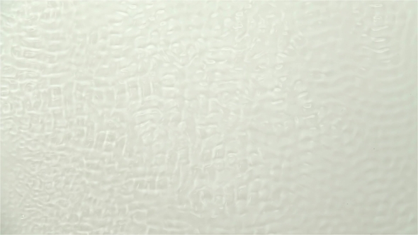 Wavy Surface of Water Caused By Sound Vibrations alt