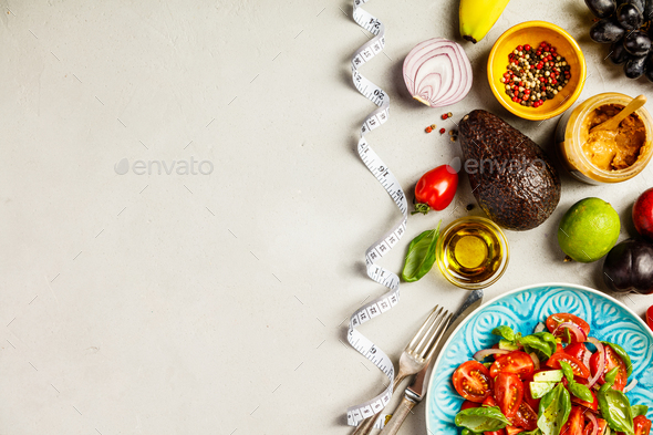 Healthy food and tape measure - Stock Photo - Images