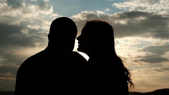 Silhouette of a Couple in Love at Sunset