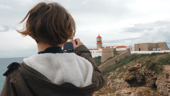 Child Tourist Taking Pictures of Cape St alt