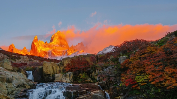 View of Mount Fitz Roy and the Waterfall in the National Park Los Glaciares National Park at Sunrise