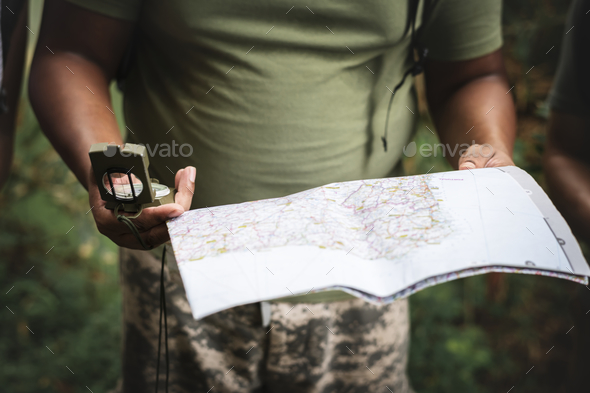 Checking on the map for directions Stock Photo by Rawpixel | PhotoDune