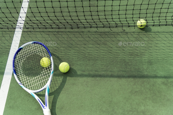 Tennis balls on a tennis court - Stock Photo - Images